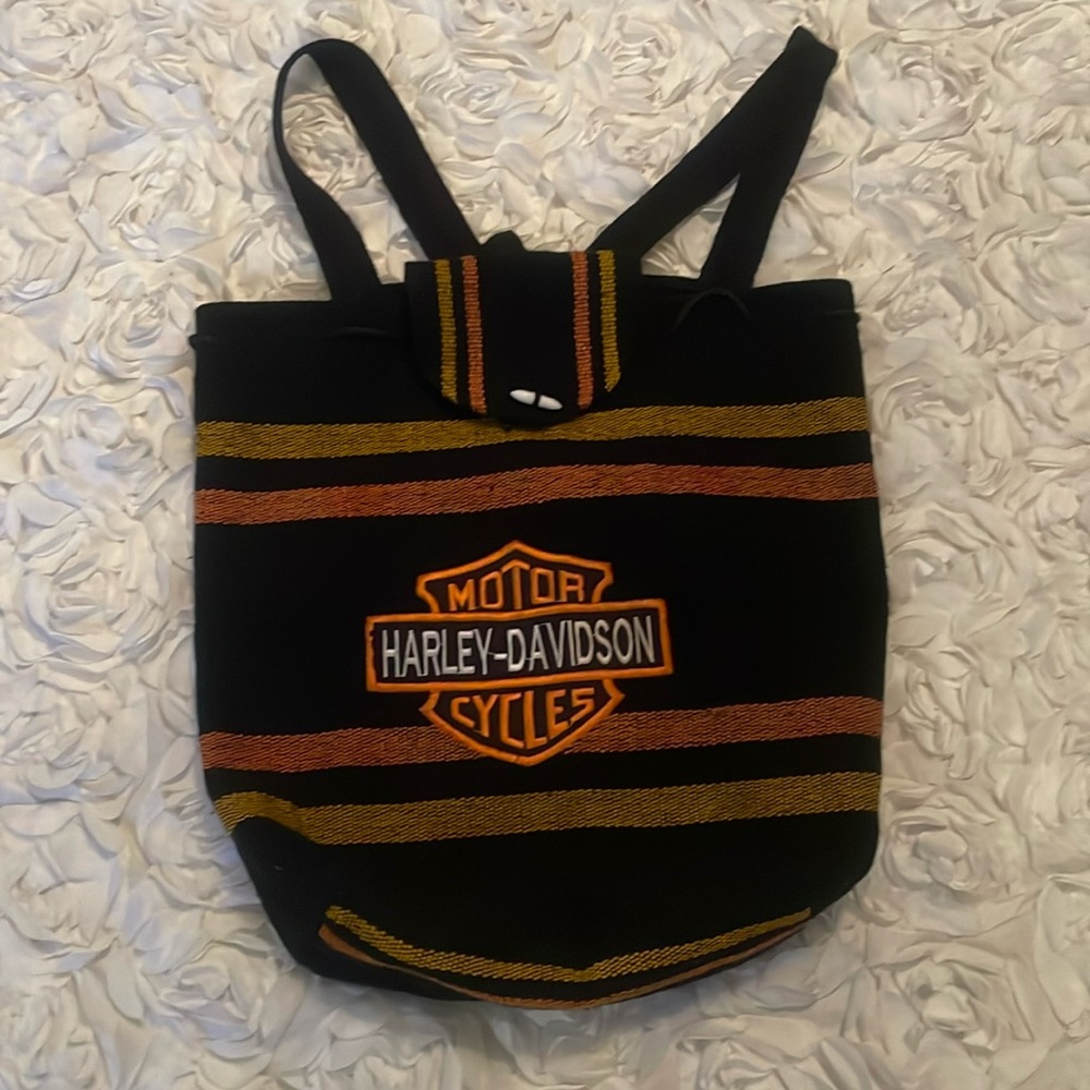 Harley Davidson, motorcycle, black and orange woven backpack .
